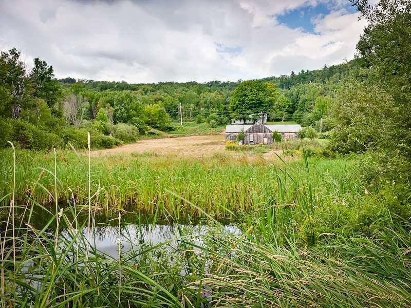 72 Wheeler Hill Road Phillips, ME 04966 - Photo 28 of 28 Yard/Garden. view of barn and house...