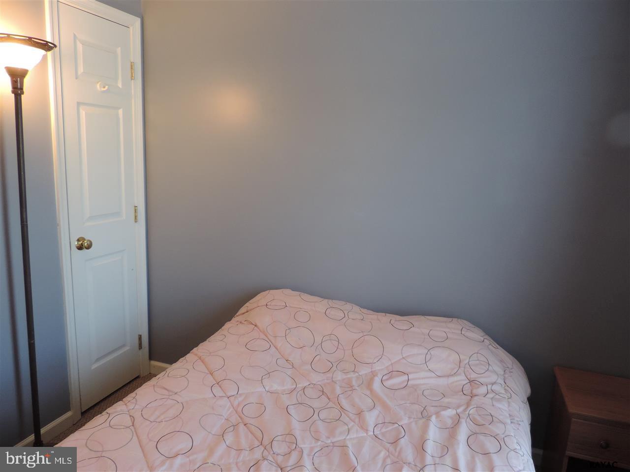 295 Elfner Road Red Lion, PA 17356 - Photo 16 of 27 a bedroom with a bed