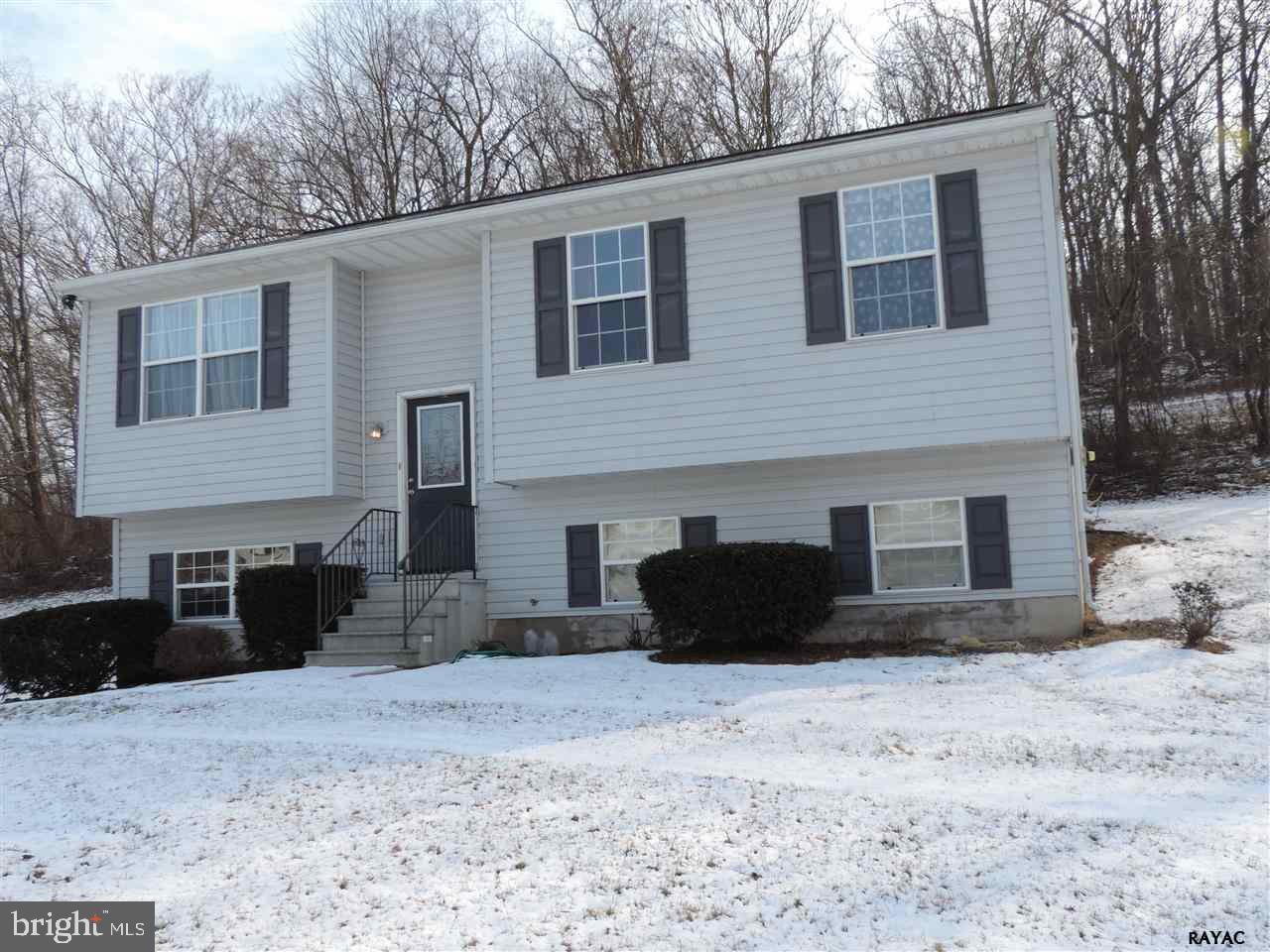 295 Elfner Road Red Lion, PA 17356 - Photo 2 of 27 a front view of a house with a yard