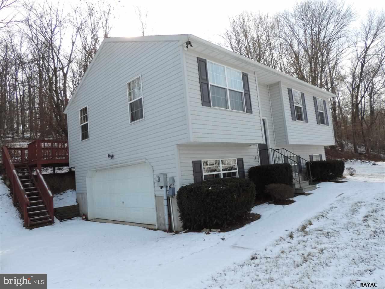 295 Elfner Road Red Lion, PA 17356 - Photo 3 of 27 a view of a house with a yard