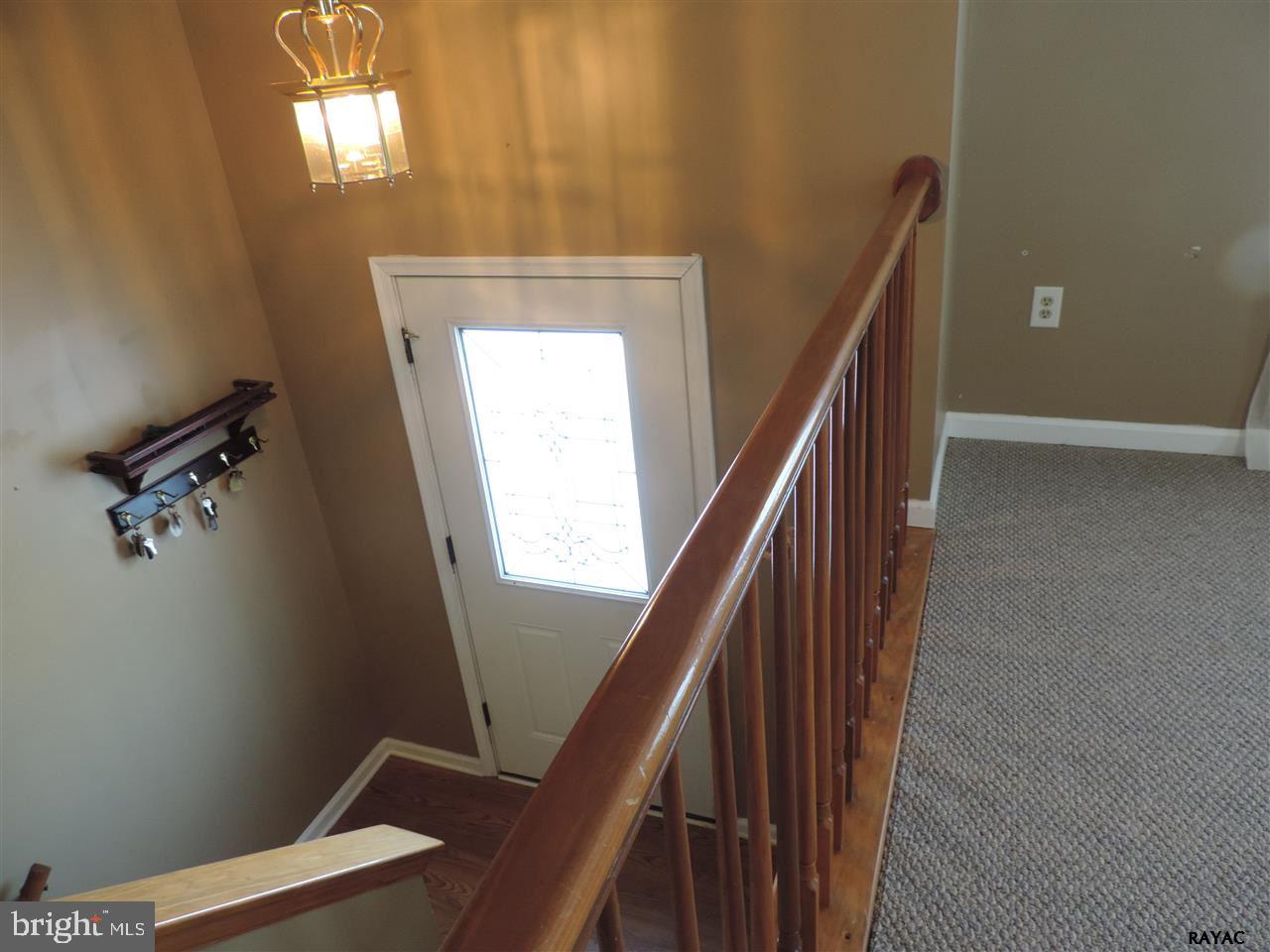 295 Elfner Road Red Lion, PA 17356 - Photo 4 of 27 a view of stairs and an empty room