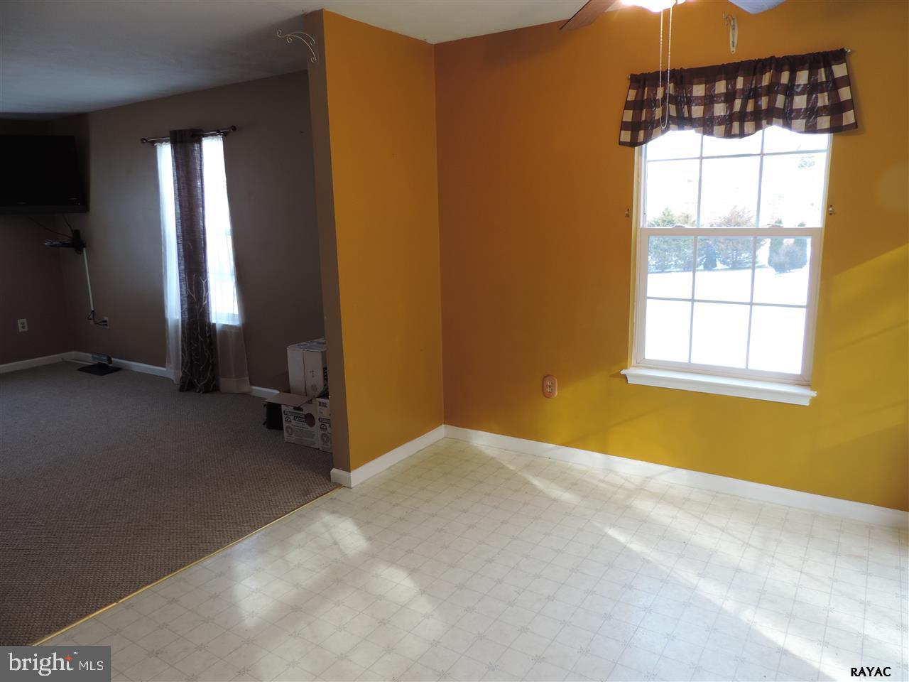 295 Elfner Road Red Lion, PA 17356 - Photo 8 of 27 an empty room with windows