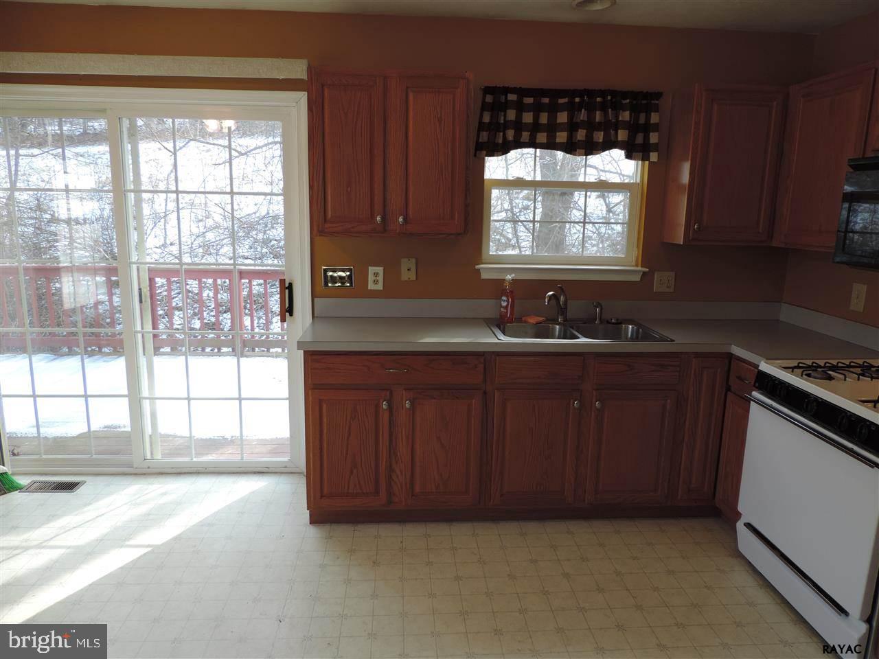 295 Elfner Road Red Lion, PA 17356 - Photo 9 of 27 a kitchen with a sink and a window