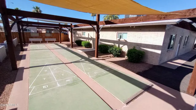 a view of swimming pool with patio