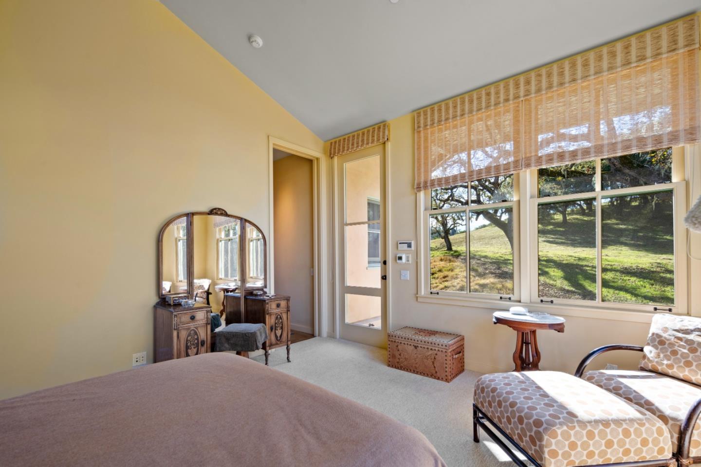 3 Refugio Trace Carmel, CA 93923 - Photo 17 of 29 a bedroom with a bed and a large window
