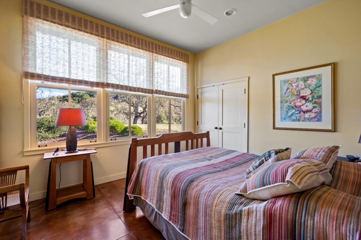 3 Refugio Trace Carmel, CA 93923 - Photo 20 of 29 a bedroom with a bed painting on wall and a large window