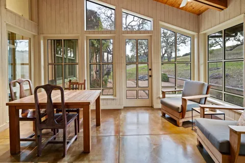a view of a livingroom with furniture