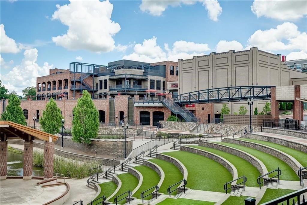 763 Woods Chapel Road Sugar Hill, GA 30518 - Photo 46 of 67 an aerial view of a house with swimming pool and furniture