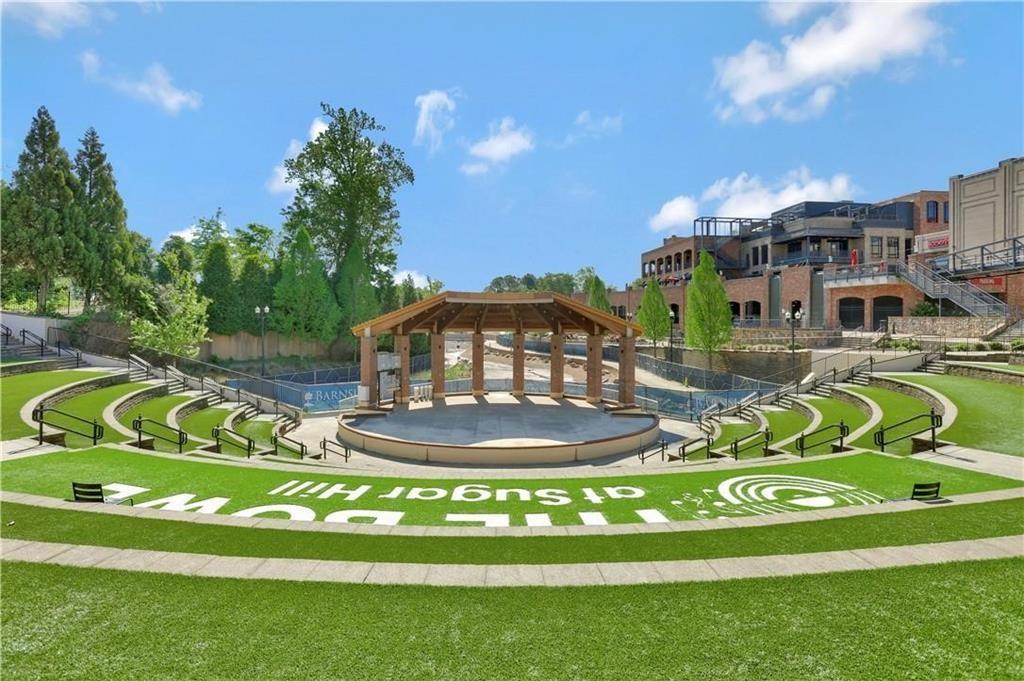 763 Woods Chapel Road Sugar Hill, GA 30518 - Photo 53 of 67 a view of swimming pool from a garden