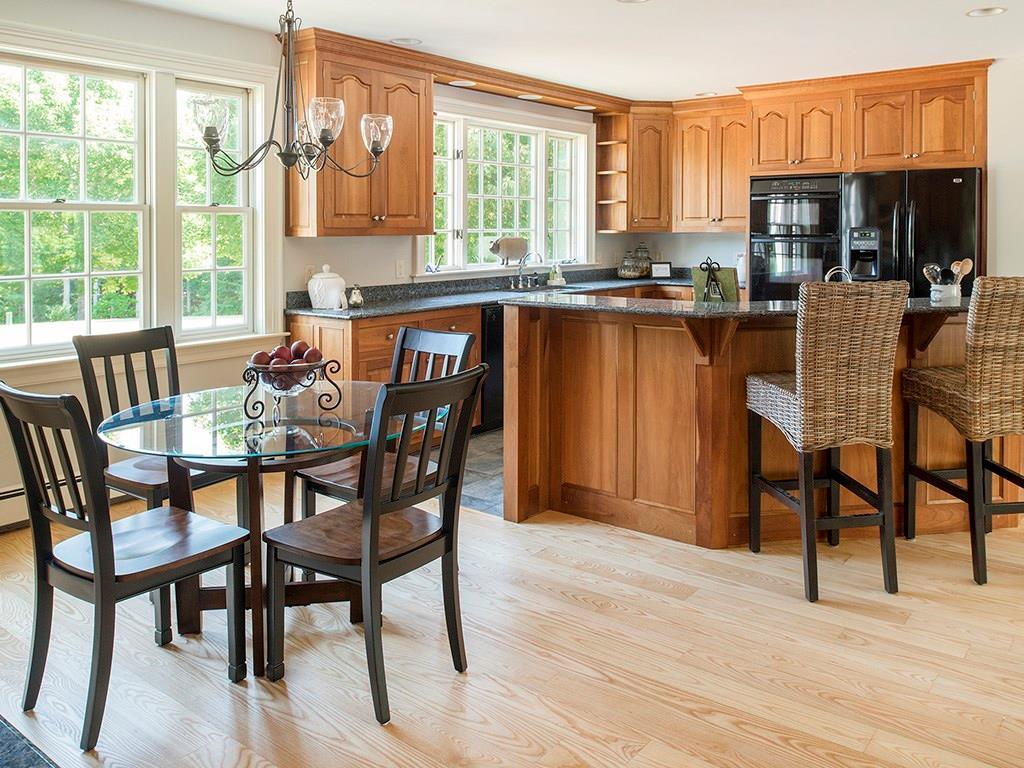 56 Strawberry Ridge Lane Cumberland Center, ME 04021 - Photo 13 of 27 The kitchen offers granite counters,...