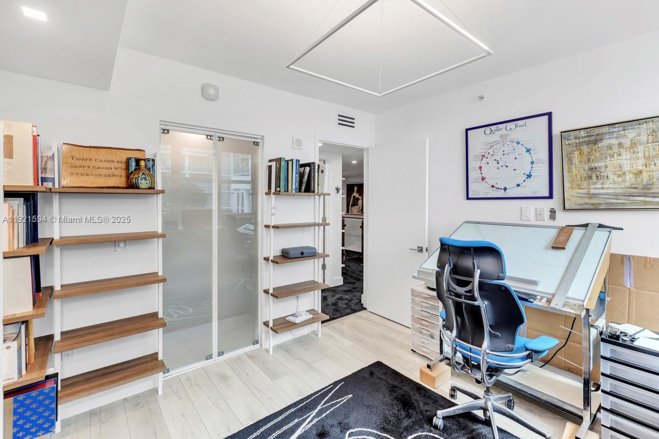 3131 Northeast 188th Street, Unit 2301 Aventura, FL 33180 - Photo 36 of 73 a view of a workspace with furniture and lounge chair