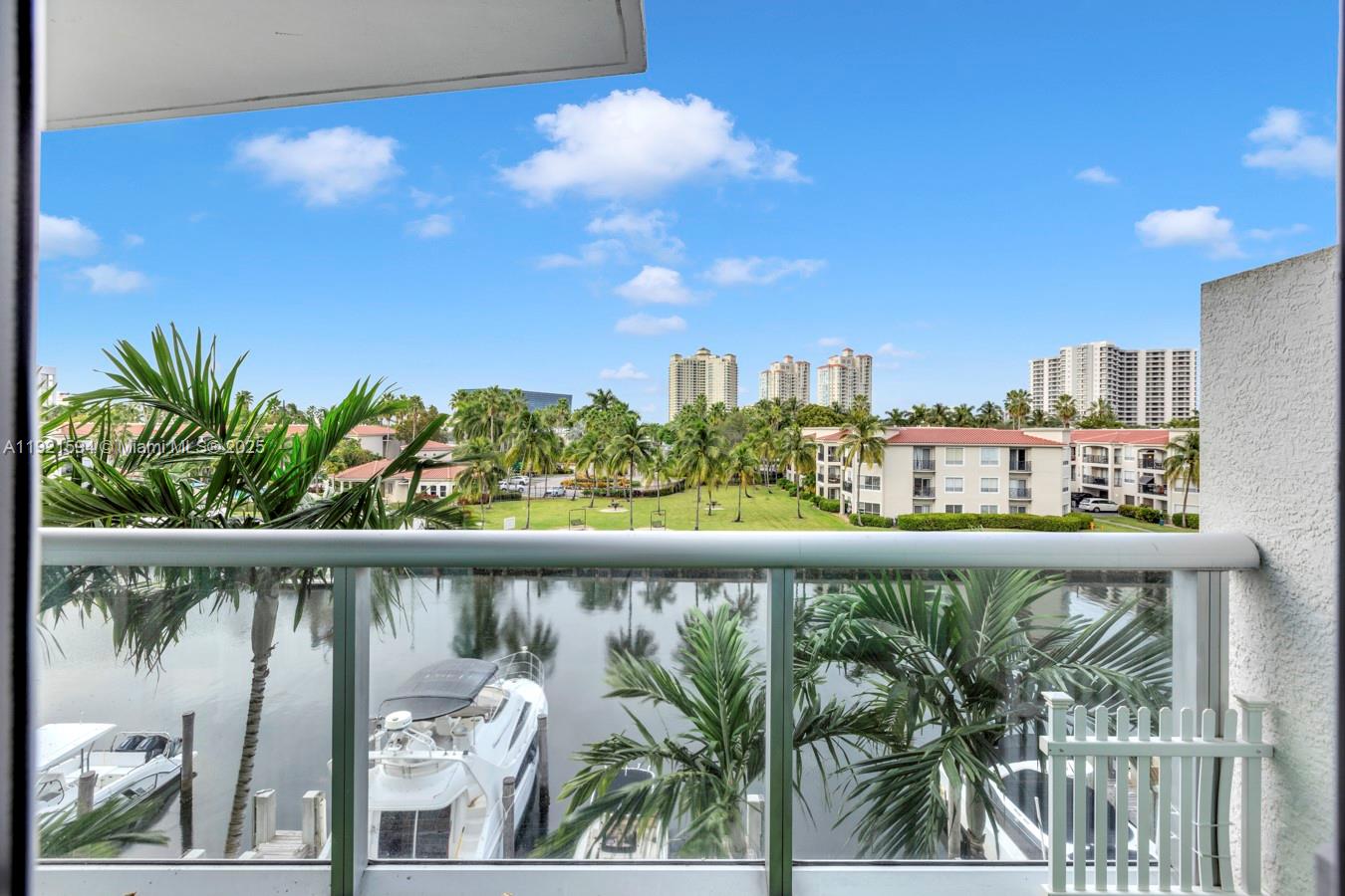 3131 Northeast 188th Street, Unit 2301 Aventura, FL 33180 - Photo 41 of 73 a view of a city skyline from a balcony