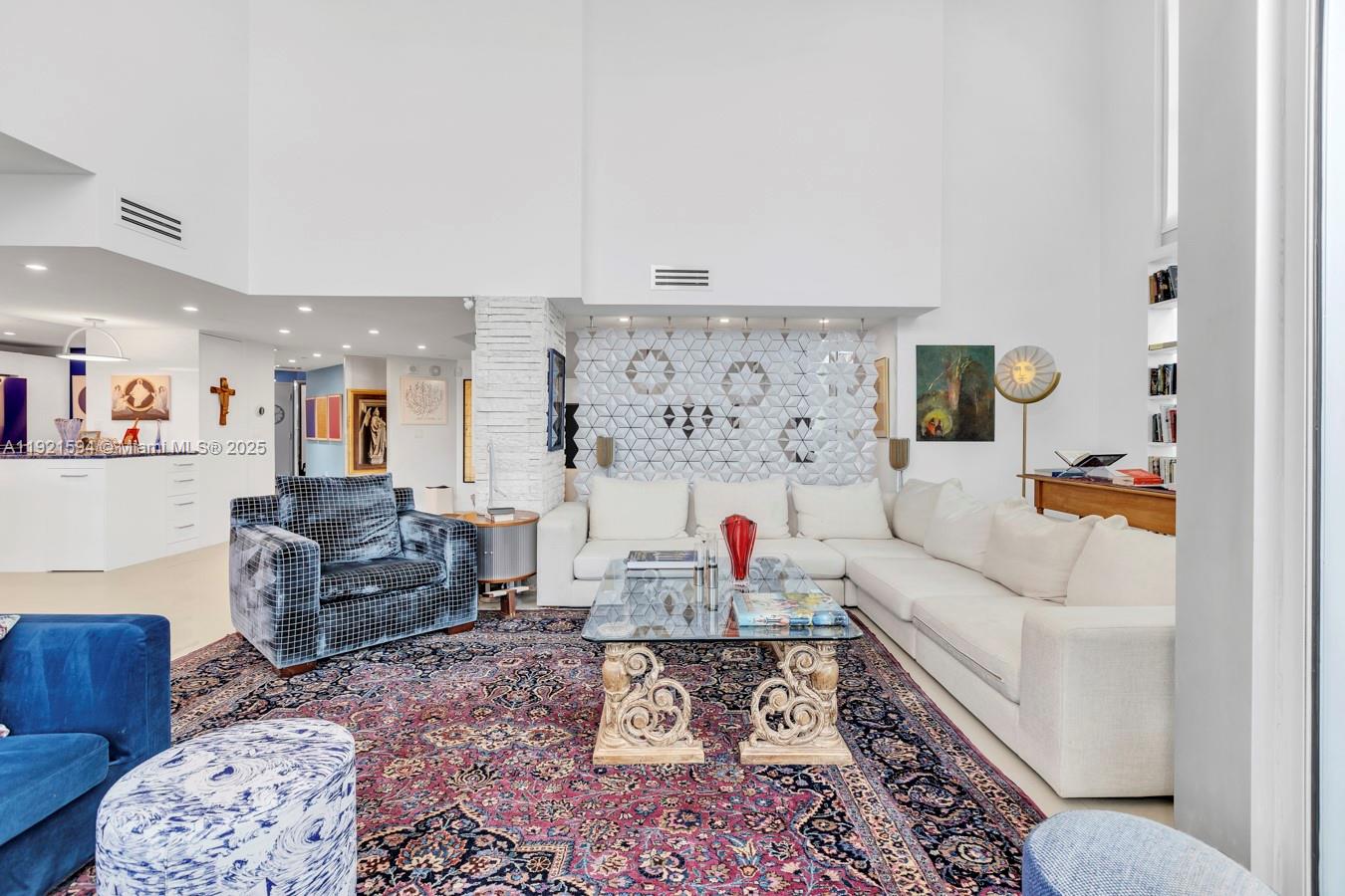 3131 Northeast 188th Street, Unit 2301 Aventura, FL 33180 - Photo 5 of 73 a living room with furniture and a couch