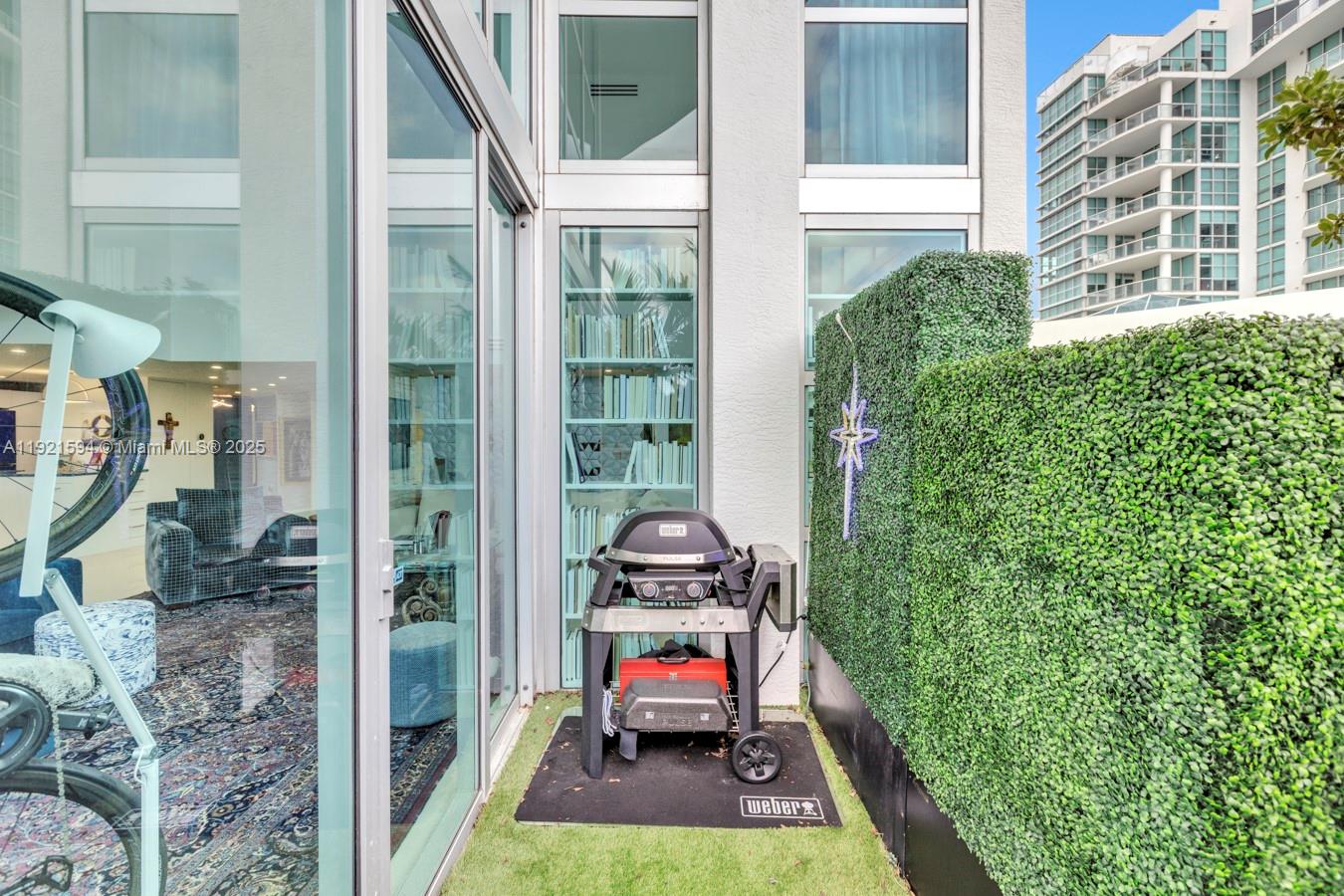 3131 Northeast 188th Street, Unit 2301 Aventura, FL 33180 - Photo 59 of 73 a car parked in front of a building