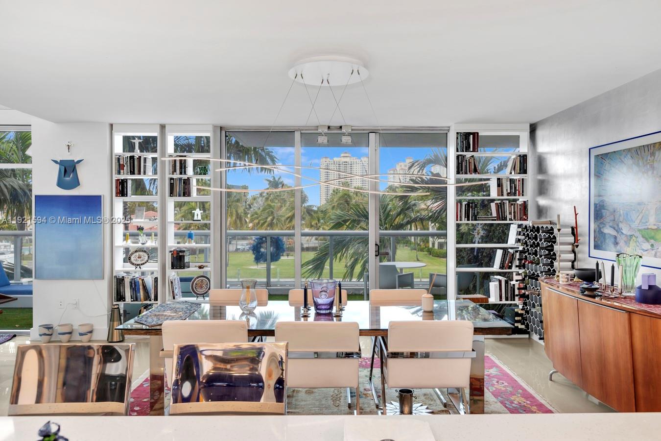 3131 Northeast 188th Street, Unit 2301 Aventura, FL 33180 - Photo 9 of 73 a living room with lots of furniture and a large window