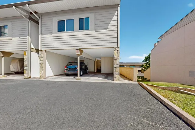 a view of a house with a street