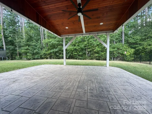 a view of a backyard of a house