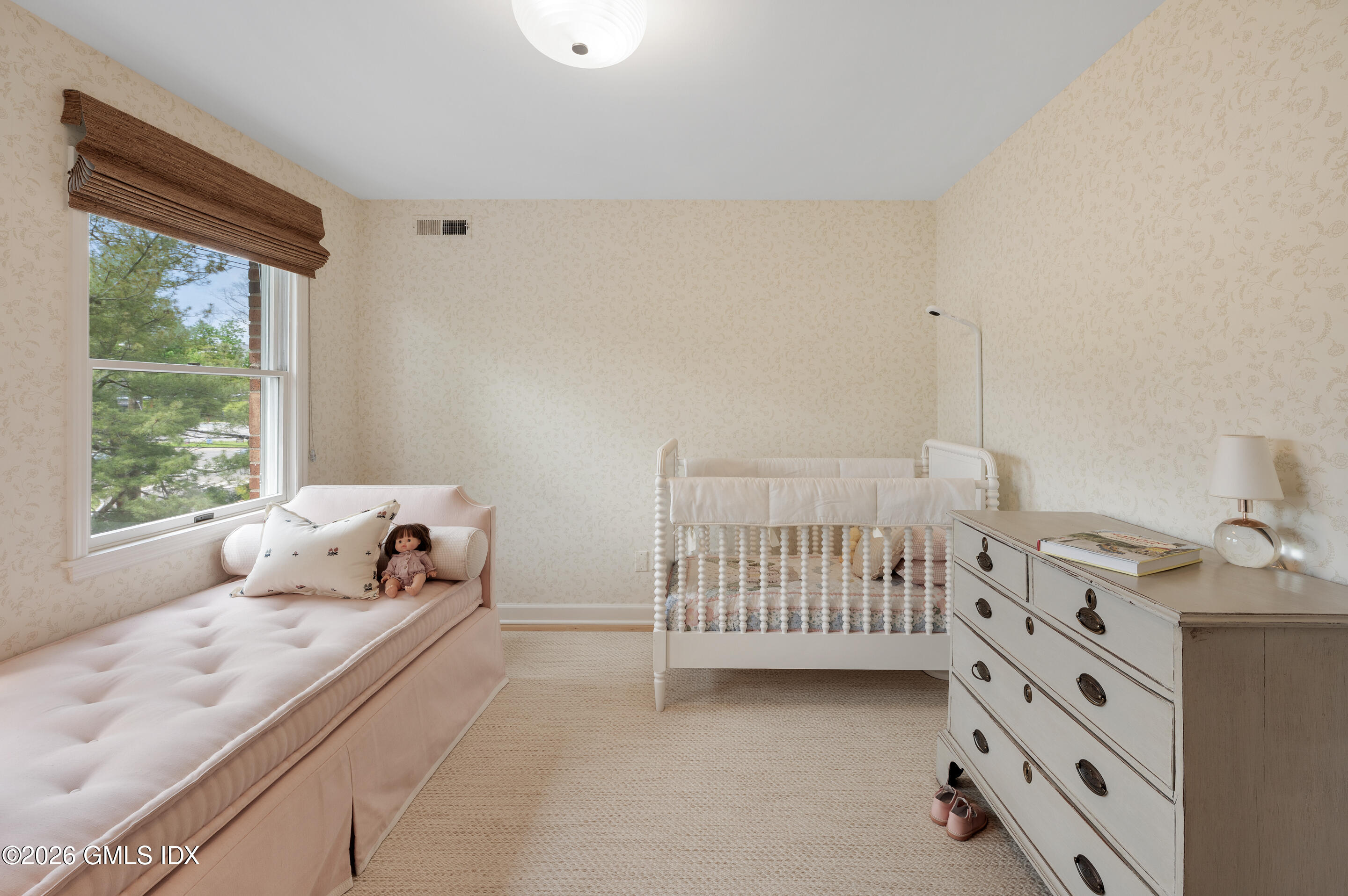 115 River Road, Unit 3 Cos Cob, CT 06807 - Photo 15 of 40 a bedroom with furniture and windows