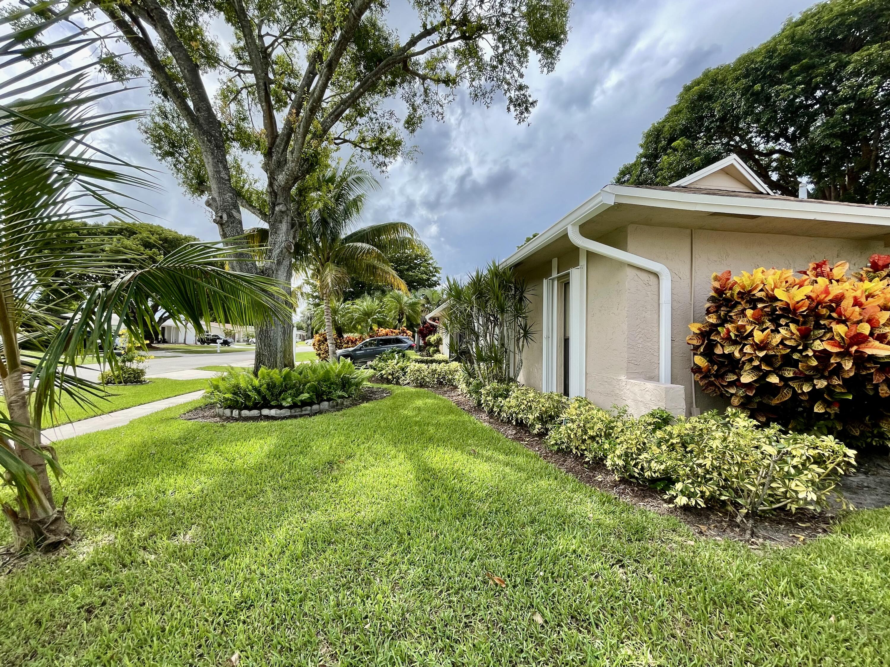 6347 Timberlakes Way Delray Beach, FL 33484 - Photo 35 of 49 View of front and side of home