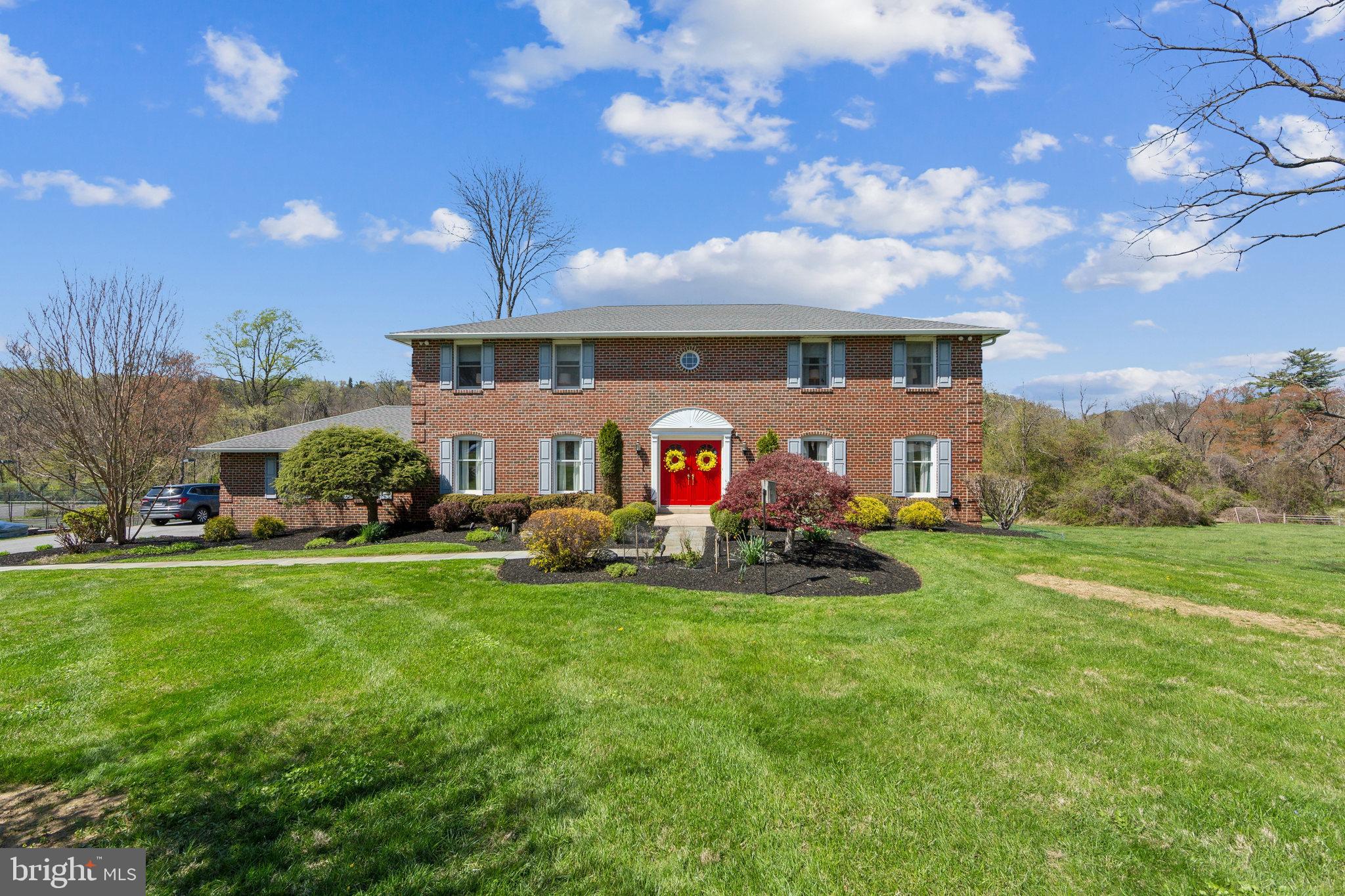 a view of a house with a big yard