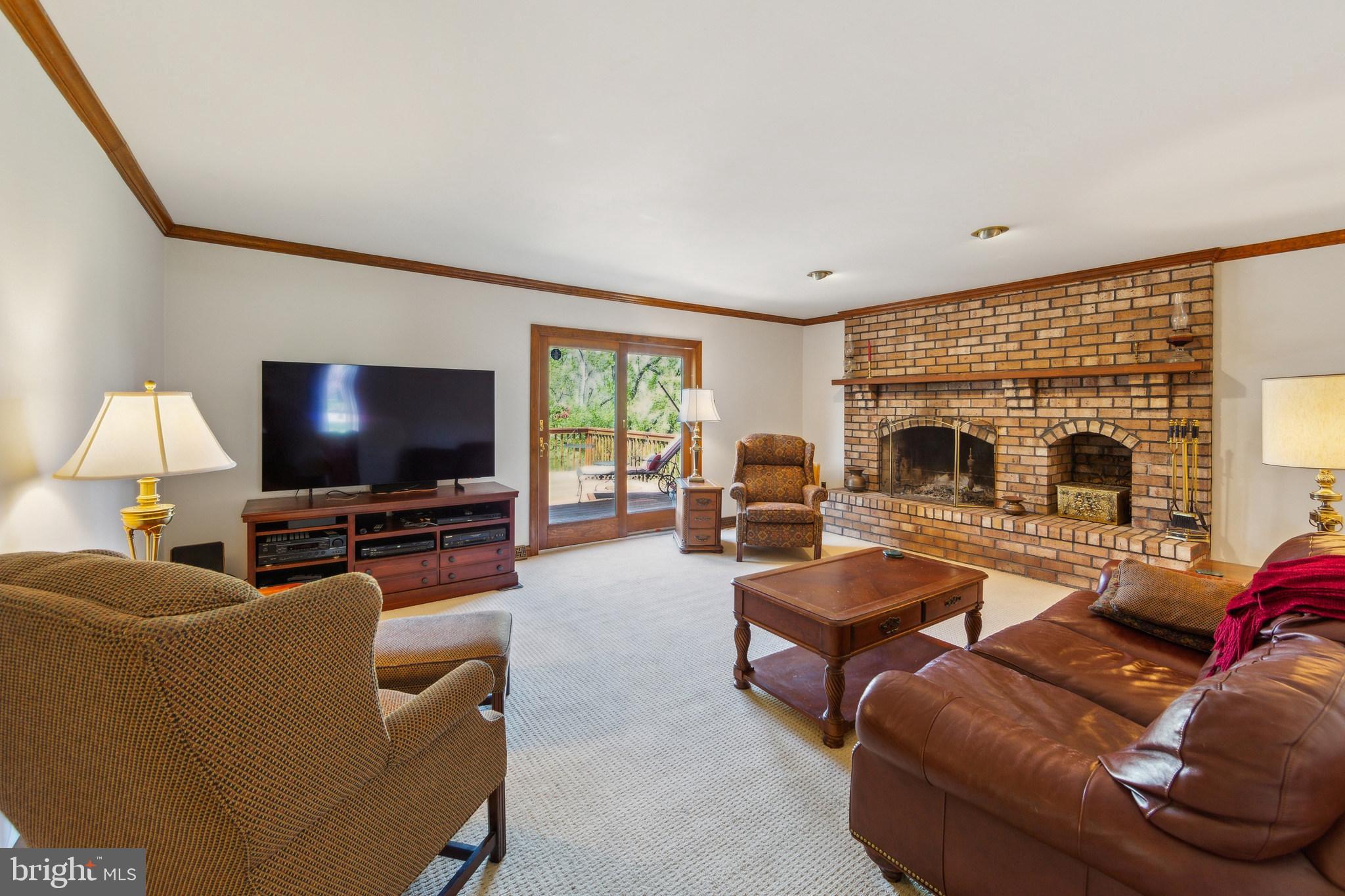 325 Tory Turn Wayne, PA 19087 - Photo 13 of 42 a living room with furniture and a flat screen tv