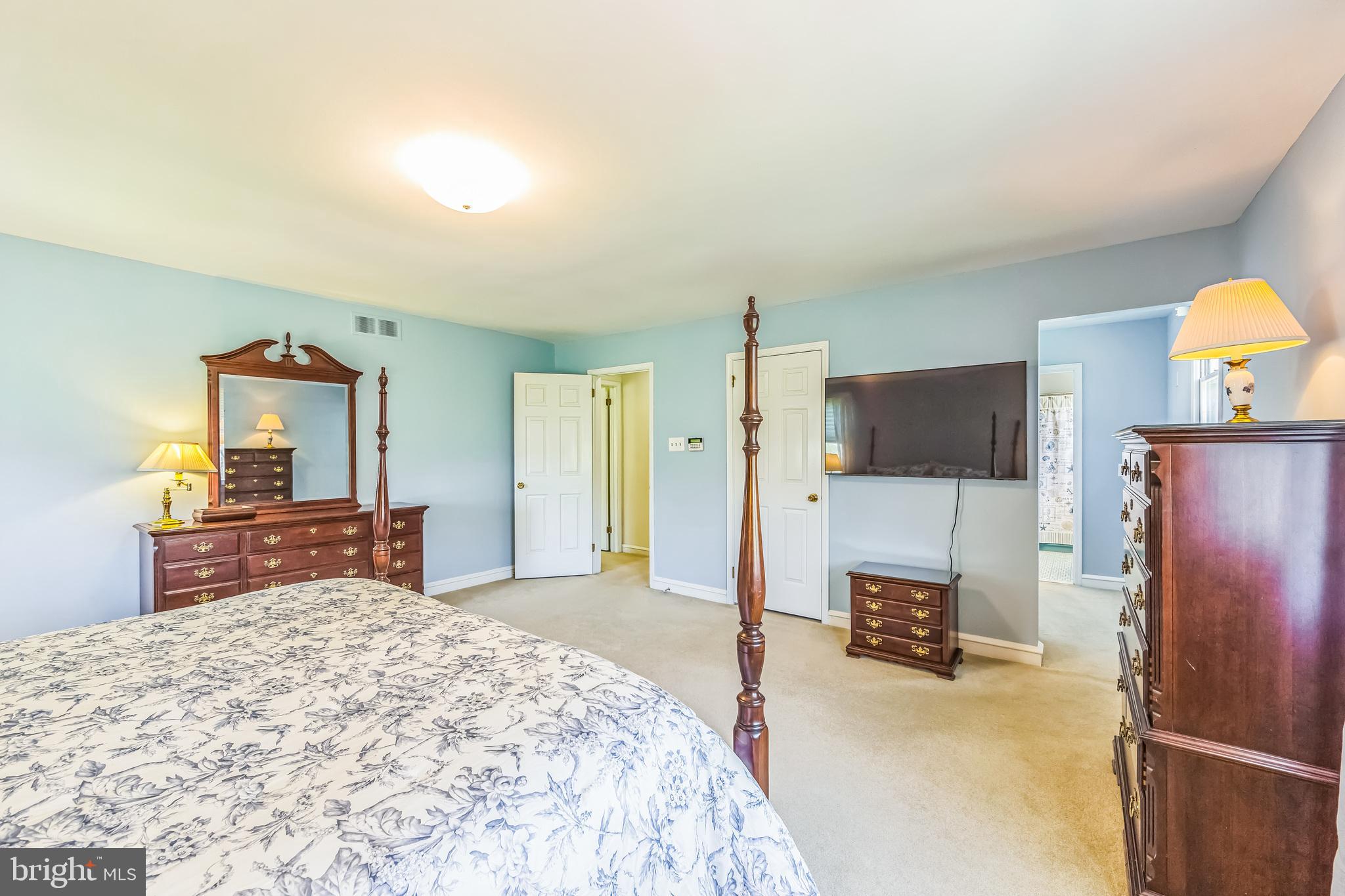 325 Tory Turn Wayne, PA 19087 - Photo 23 of 42 a bedroom with a bed and a flat screen television