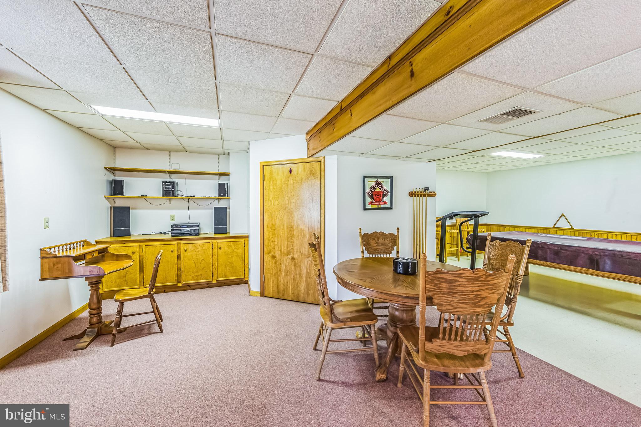 325 Tory Turn Wayne, PA 19087 - Photo 34 of 42 a dining room with furniture and a rug