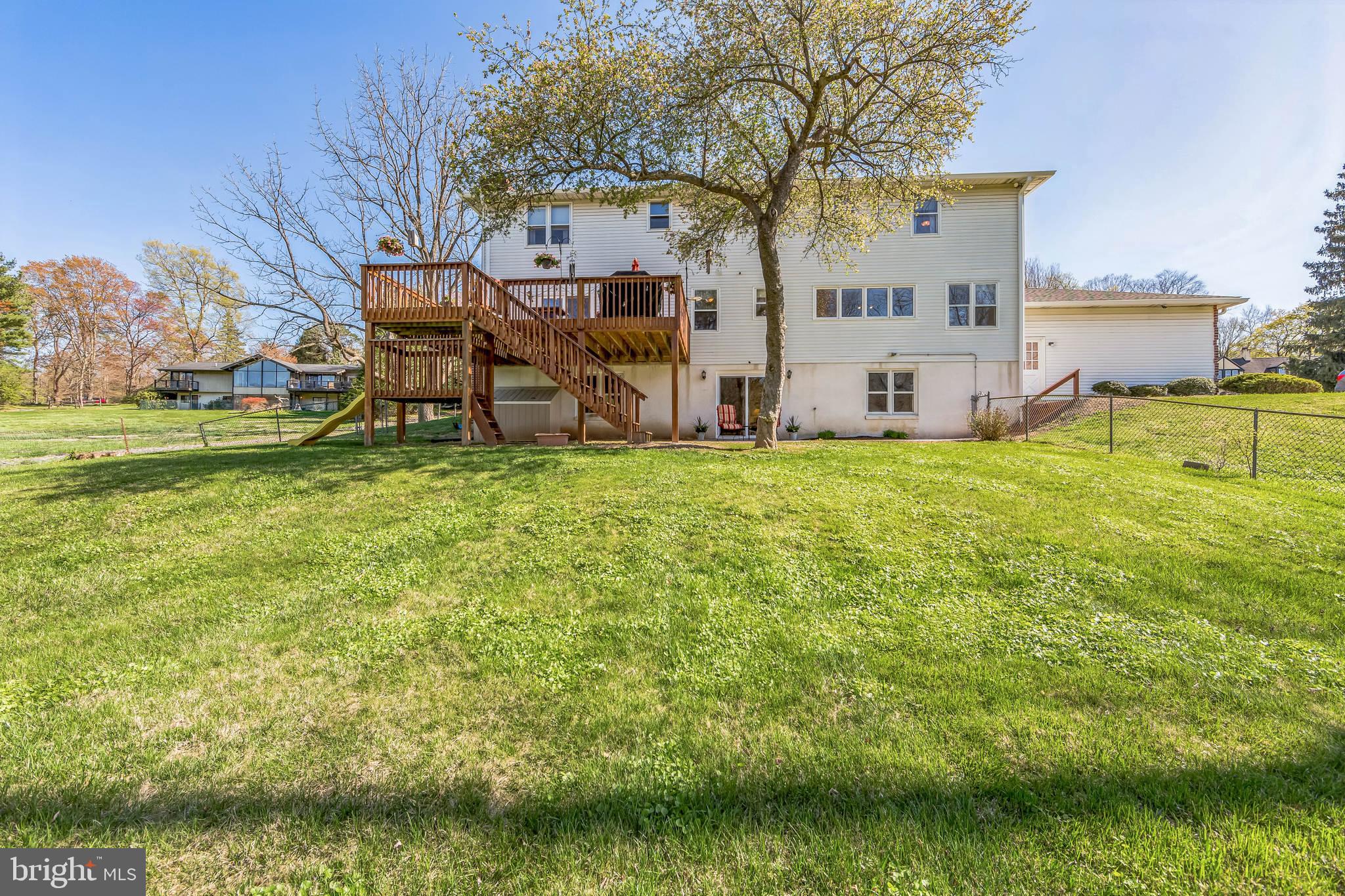 325 Tory Turn Wayne, PA 19087 - Photo 36 of 42 a backyard of a house with table and chairs