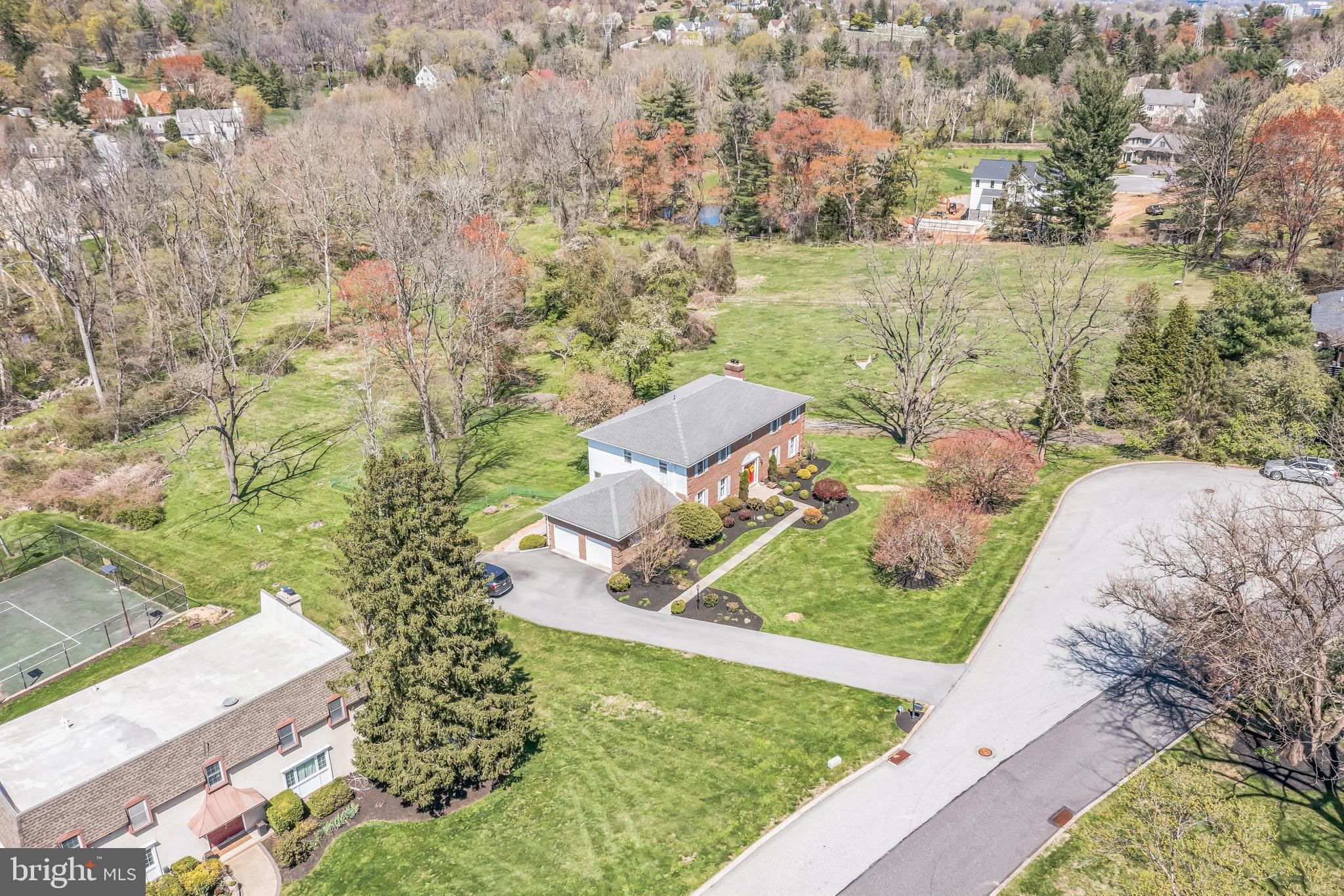 325 Tory Turn Wayne, PA 19087 - Photo 41 of 42 an aerial view of a house with a yard and lake view in back