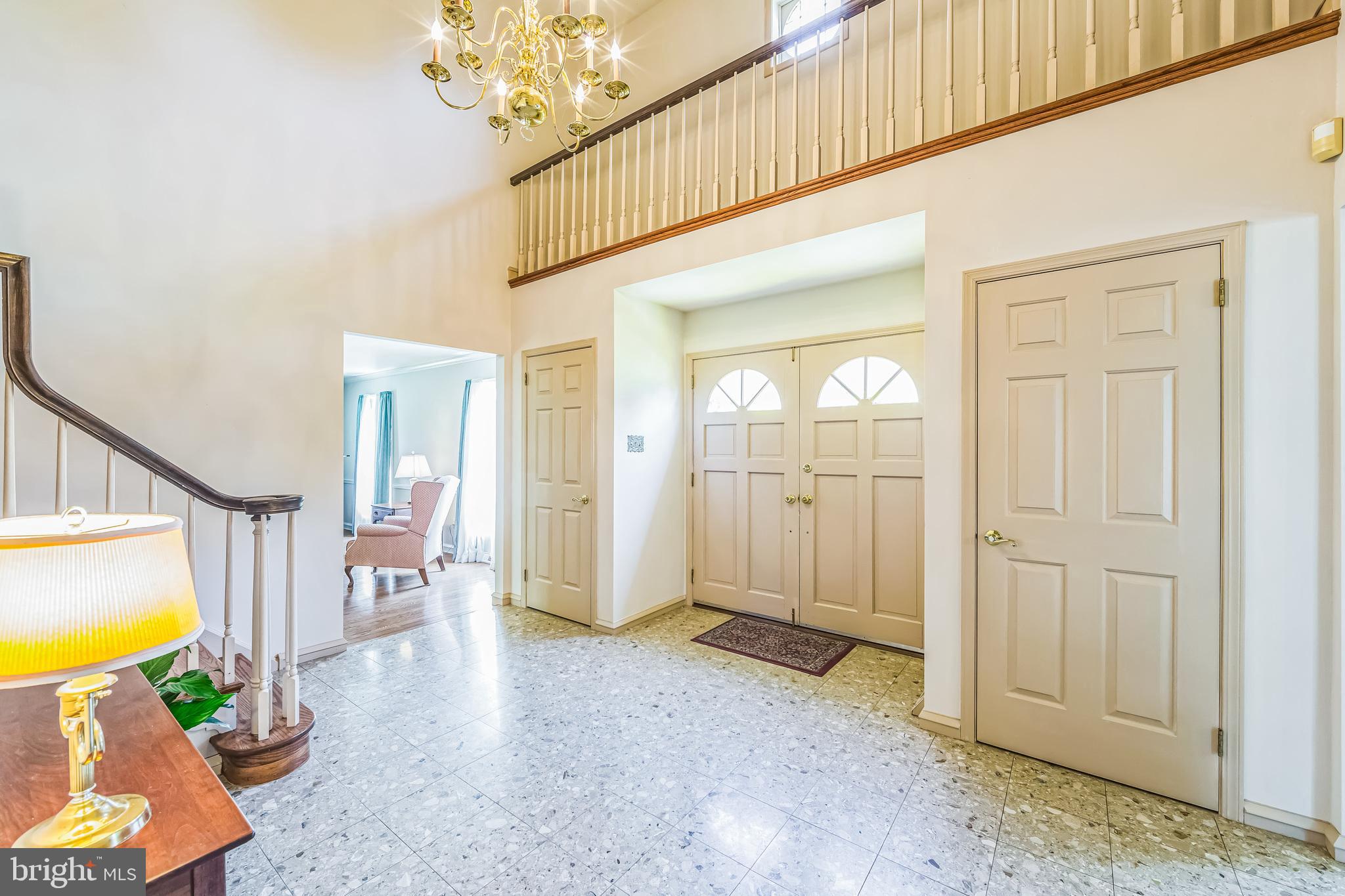 325 Tory Turn Wayne, PA 19087 - Photo 5 of 42 a view of a livingroom with wooden floor and a chandelier