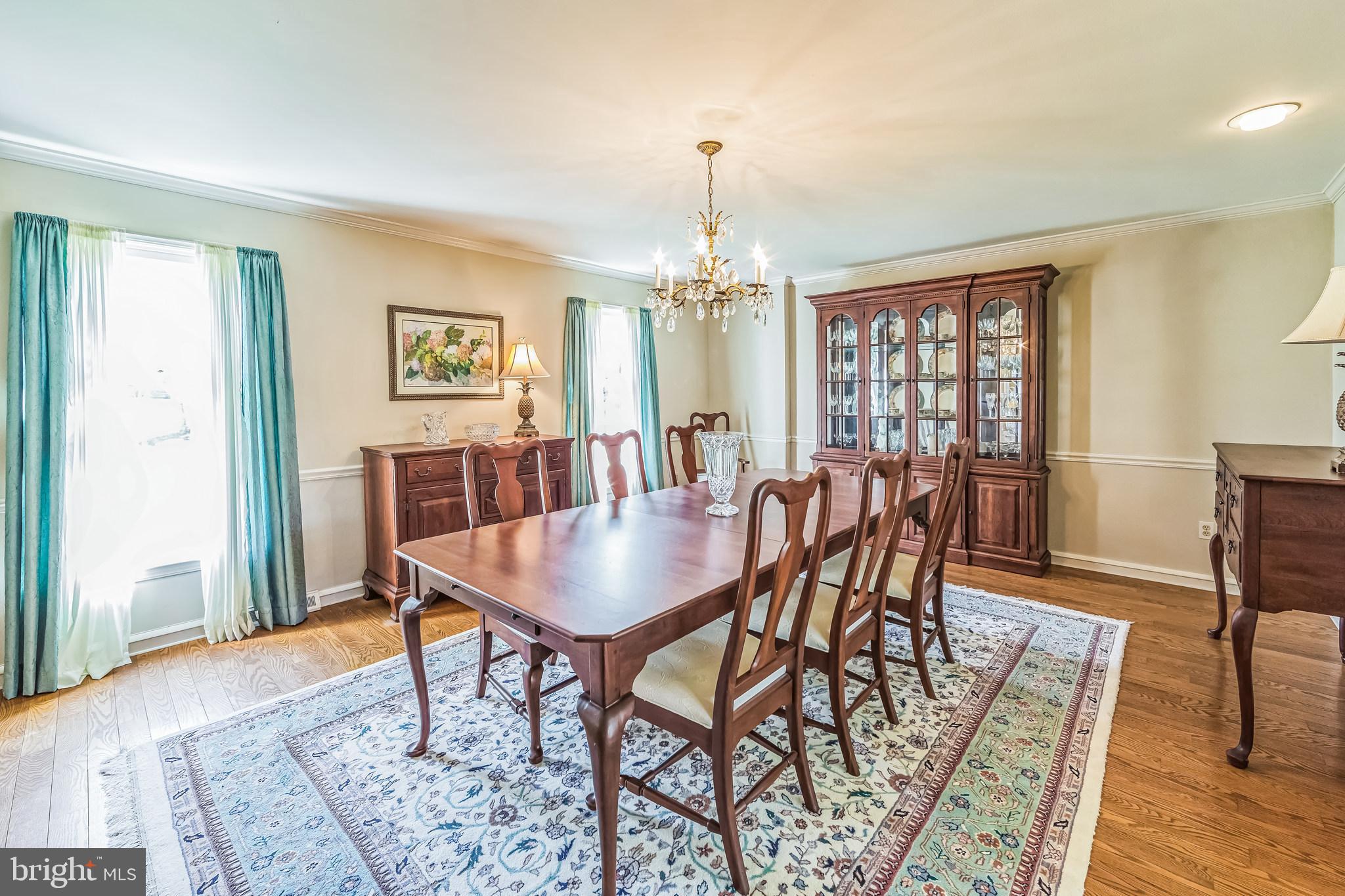 325 Tory Turn Wayne, PA 19087 - Photo 6 of 42 a view of a dining room with furniture window and wooden floor