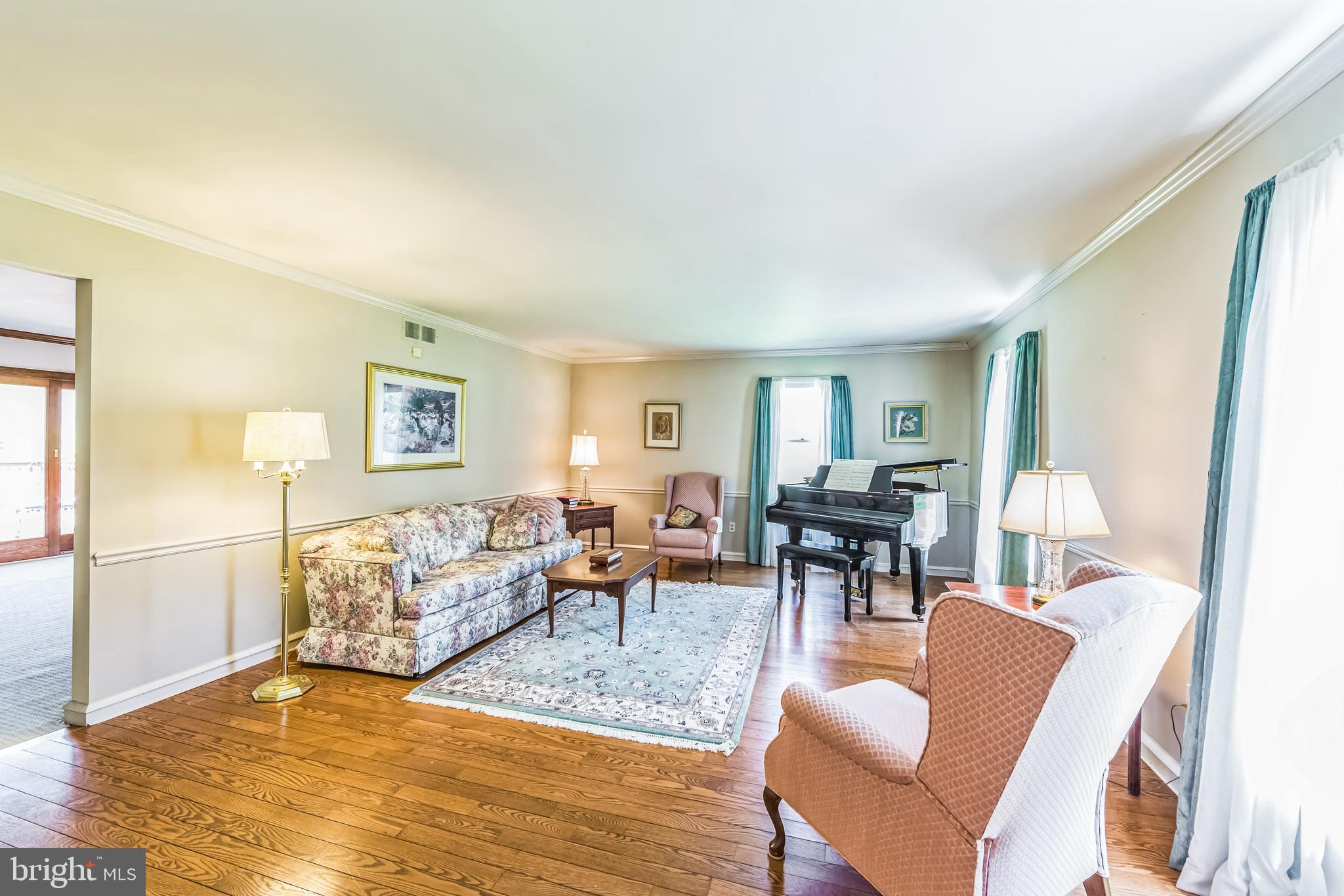 325 Tory Turn Wayne, PA 19087 - Photo 7 of 42 a living room with furniture and a wooden floor