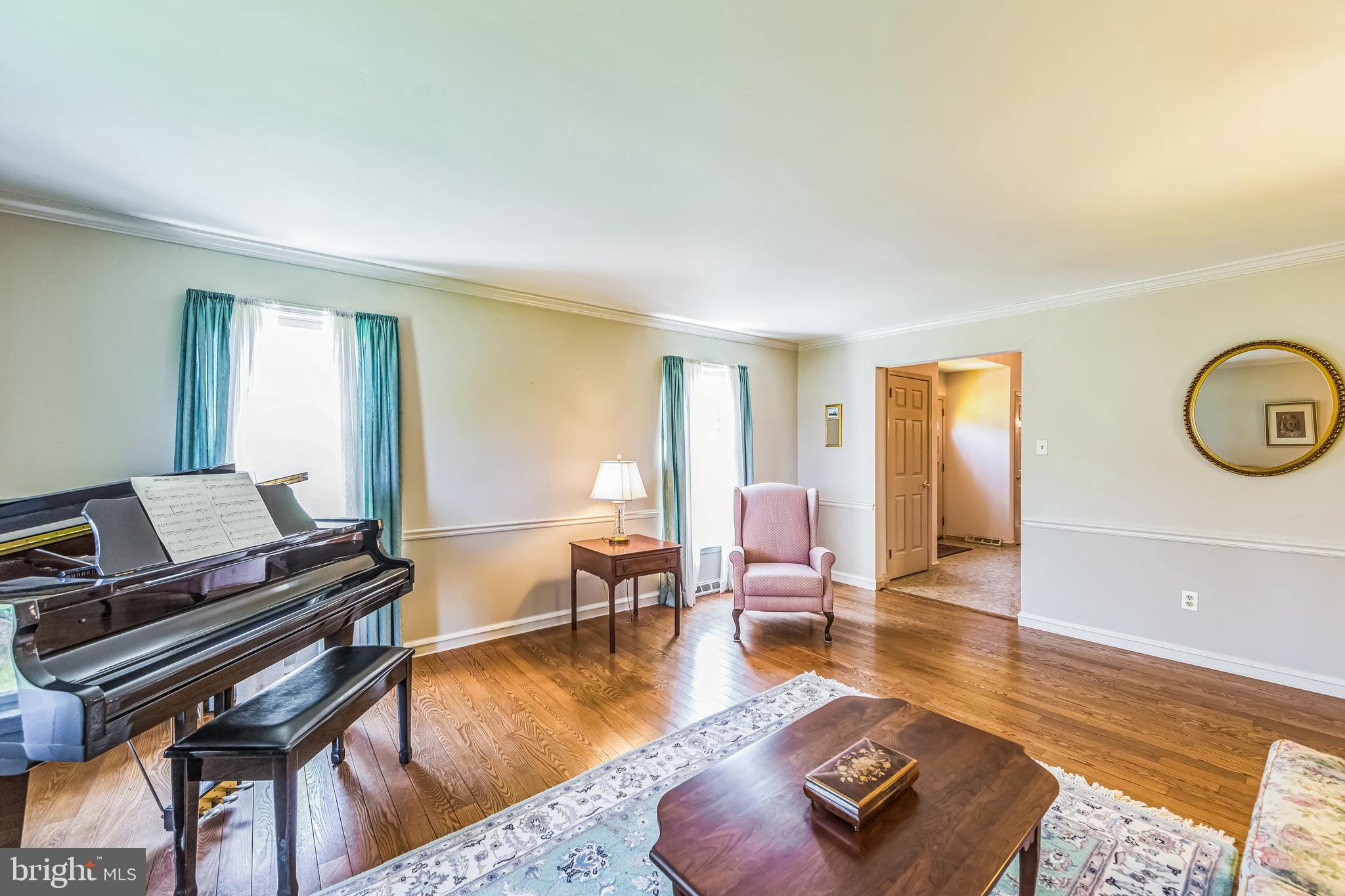 325 Tory Turn Wayne, PA 19087 - Photo 8 of 42 a living room with furniture and a wooden floor
