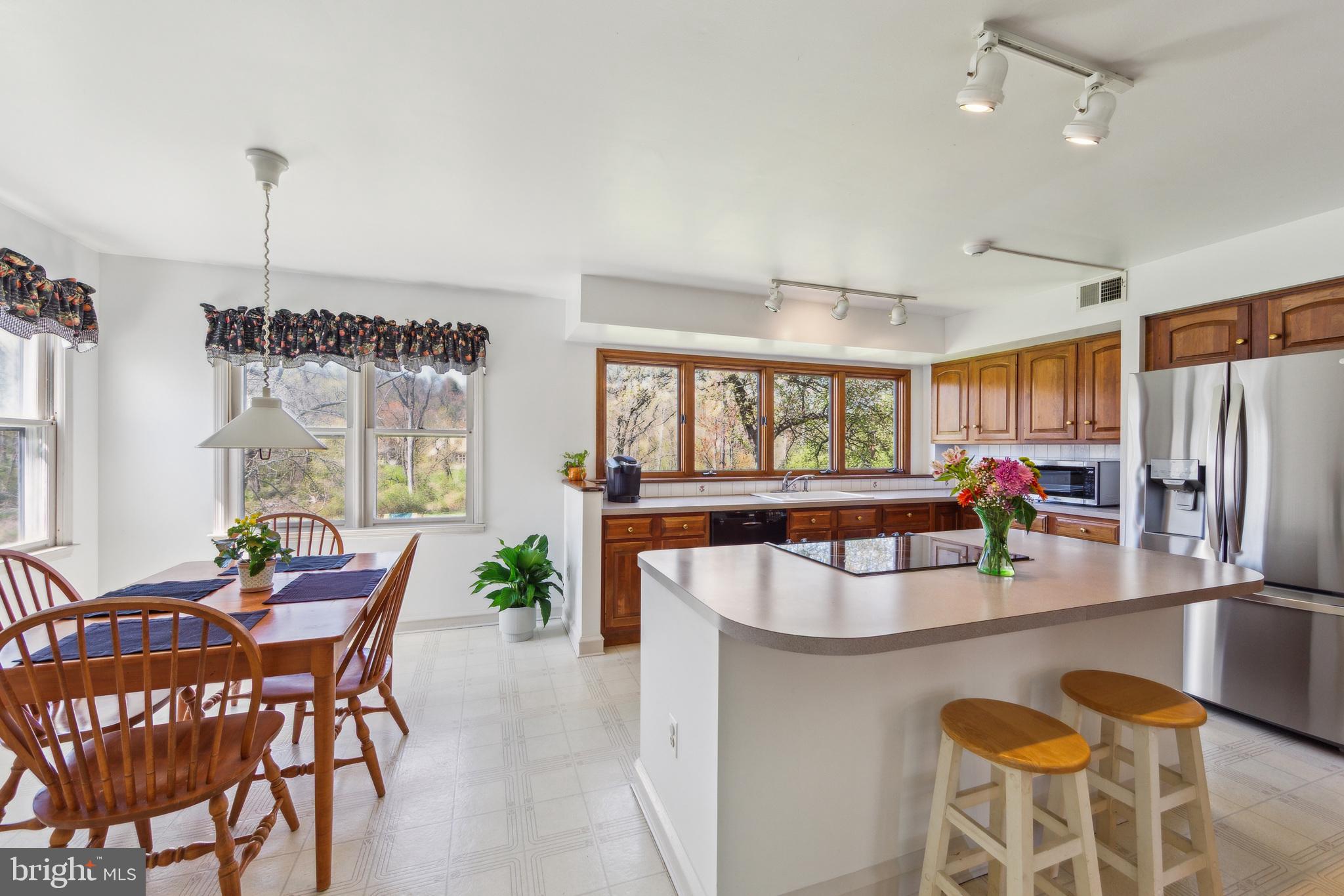 325 Tory Turn Wayne, PA 19087 - Photo 10 of 42 a dining room with furniture and a chandelier