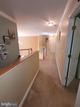 a view of a hallway with a large window