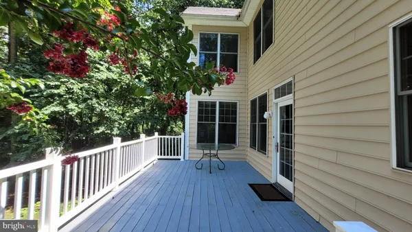 a porch with seating space and yard