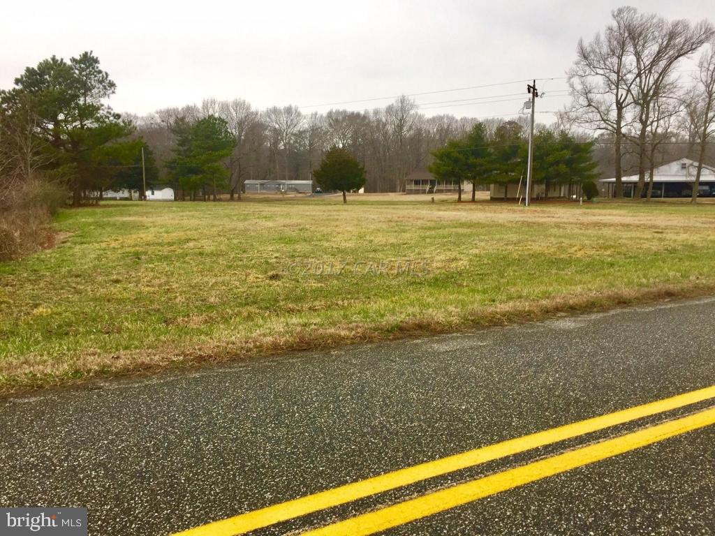 Lot 10 Bell Road Whaleyville, MD 21872 - Photo 2 of 5 a view of a large body of water with a building in the background