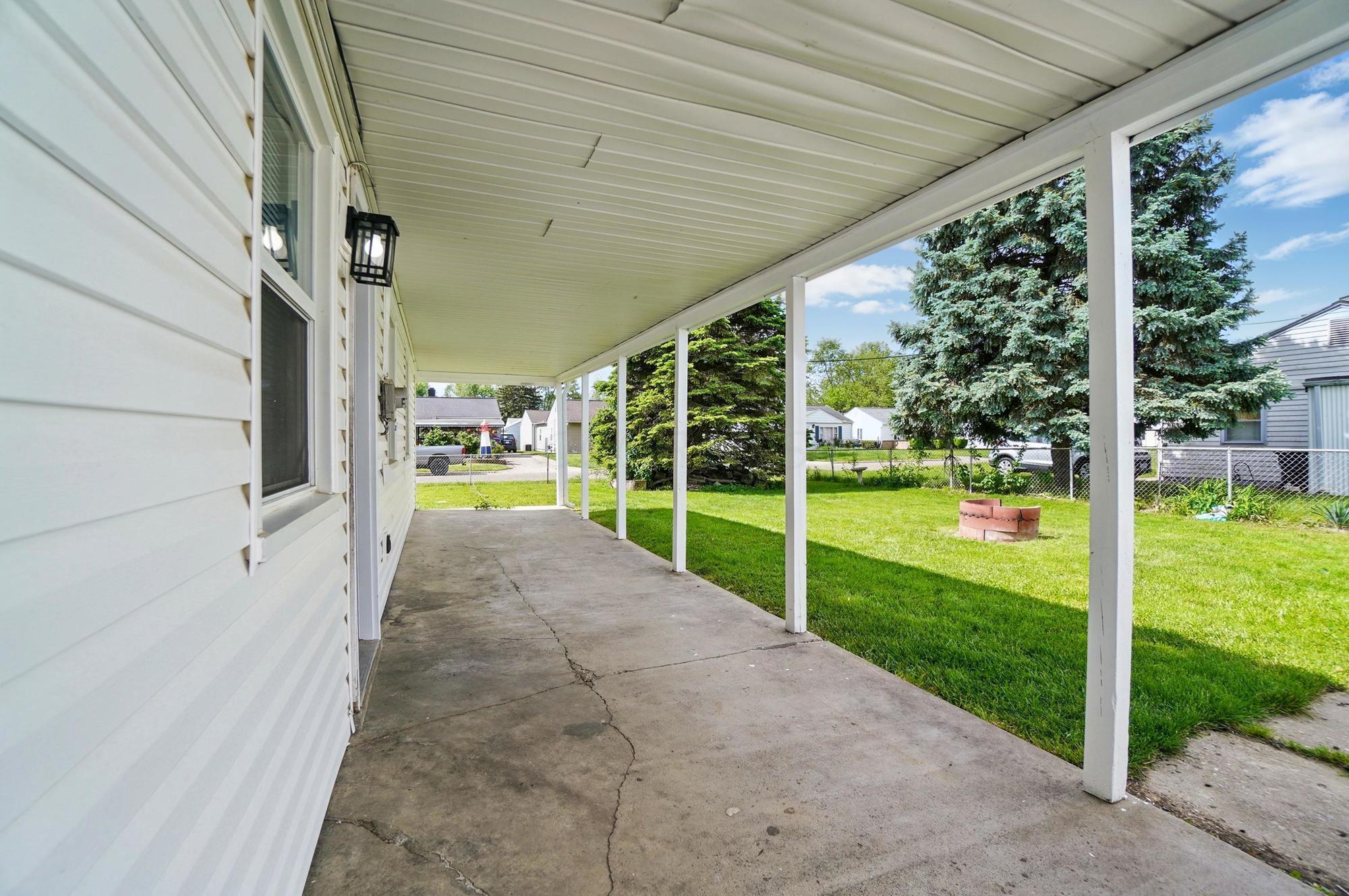 4561 St Rita Lane Columbus, OH 43213 - Photo 25 of 34 Rear covered patio