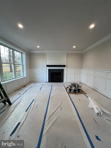 a stove top oven sitting inside of a kitchen