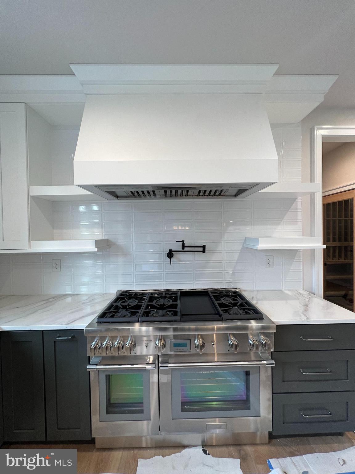 340 Hidden River Road Penn Valley, PA 19072 - Photo 23 of 57 a stove top oven sitting inside of a kitchen