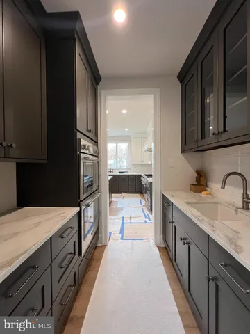 a view of balcony with wooden floor