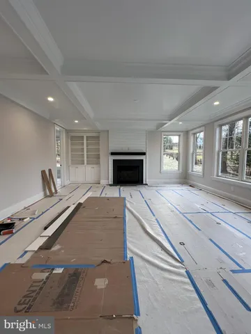 a kitchen with a cabinets and window