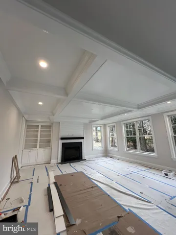 a kitchen with a sink a stove and cabinets