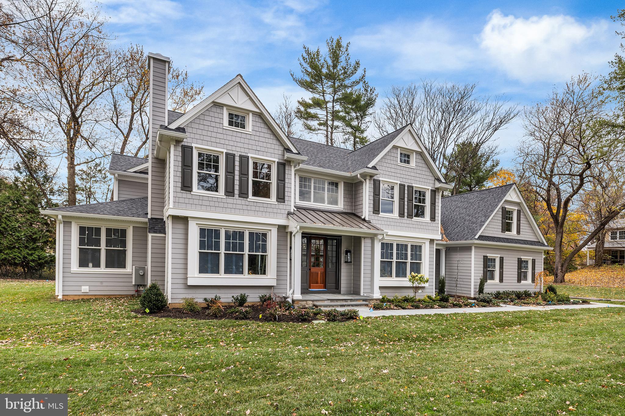 340 Hidden River Road Penn Valley, PA 19072 - Photo 4 of 57 a front view of a house with a garden