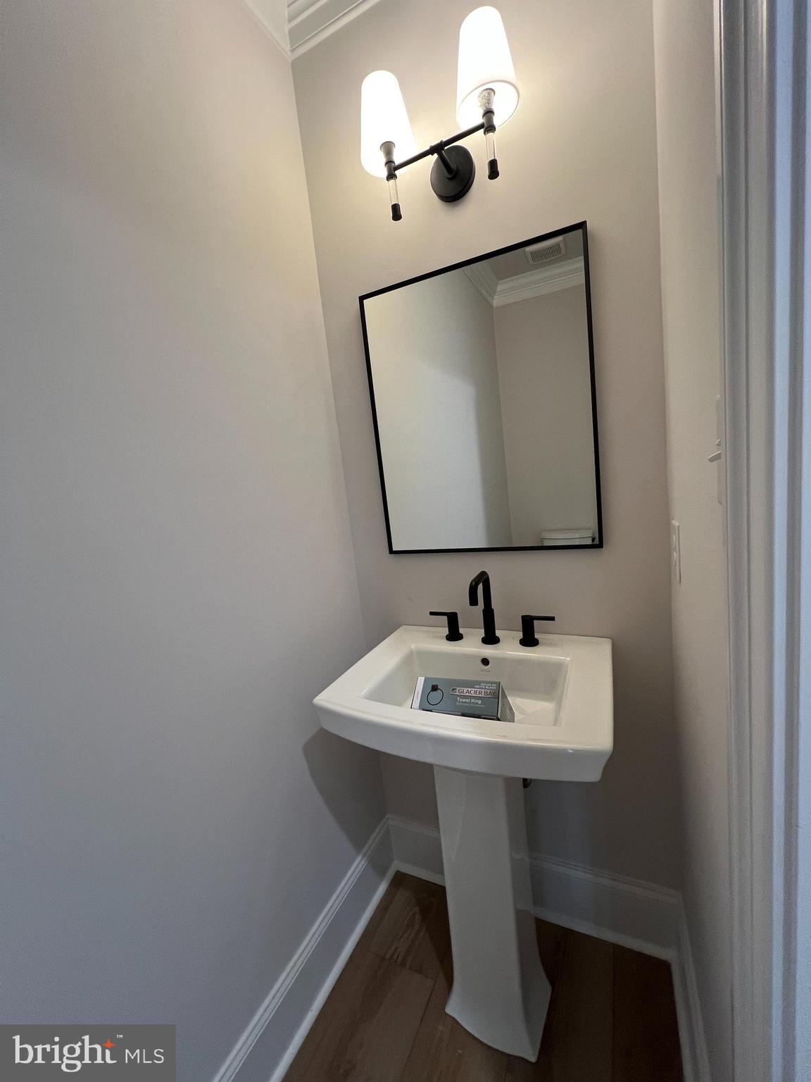 340 Hidden River Road Penn Valley, PA 19072 - Photo 50 of 57 a bathroom with a sink and a mirror