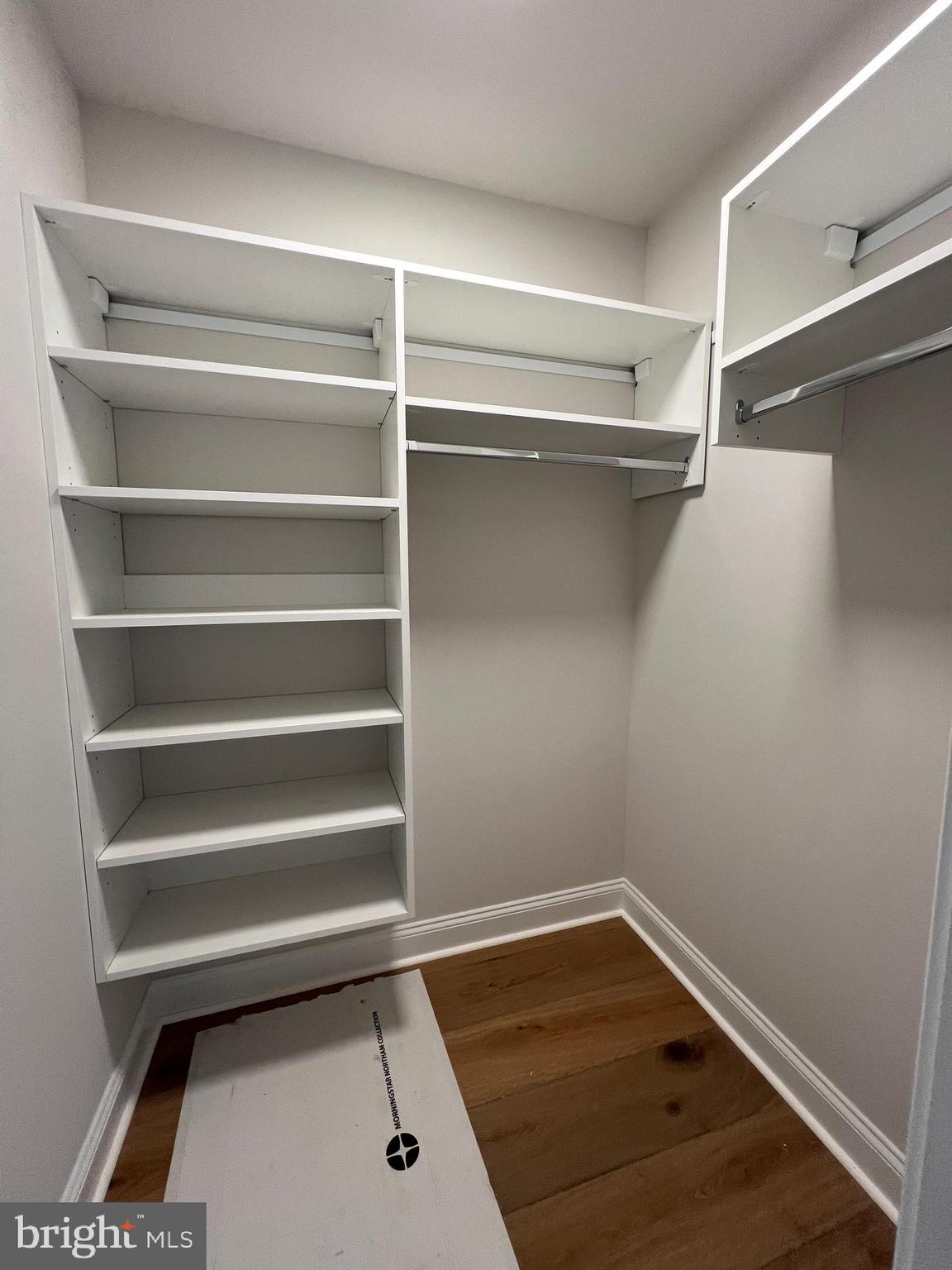 340 Hidden River Road Penn Valley, PA 19072 - Photo 53 of 57 a room with a closet and wooden floor