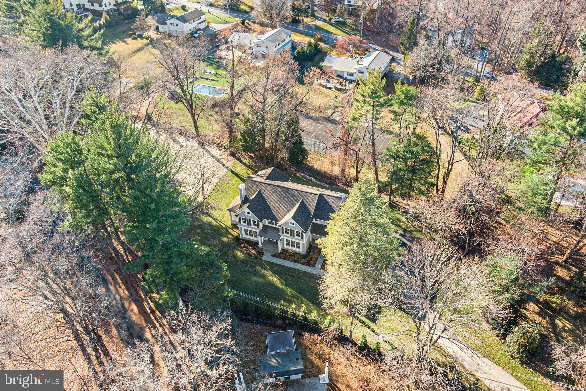 340 Hidden River Road Penn Valley, PA 19072 - Photo 57 of 57 a backyard of a house with lots of trees