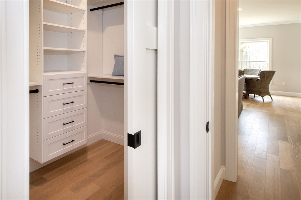 6 Grace Way, Unit 6 Scituate, MA 02066 - Photo 12 of 21 a view of a bedroom with a wardrobe space