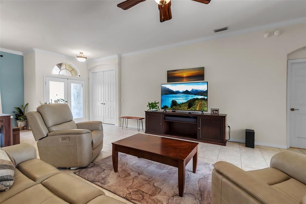 730 Old Quarry Road Bradenton, FL 34212 - Photo 14 of 65 a living room with furniture and a flat screen tv