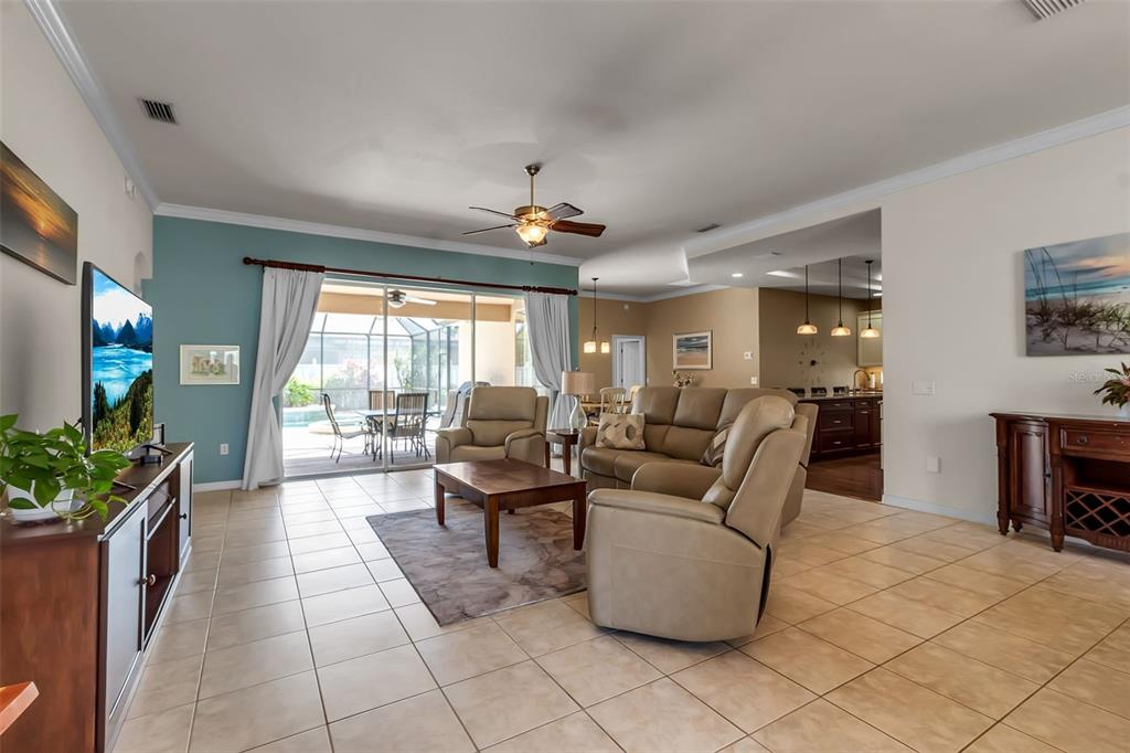 730 Old Quarry Road Bradenton, FL 34212 - Photo 16 of 65 a living room with furniture and a flat screen tv